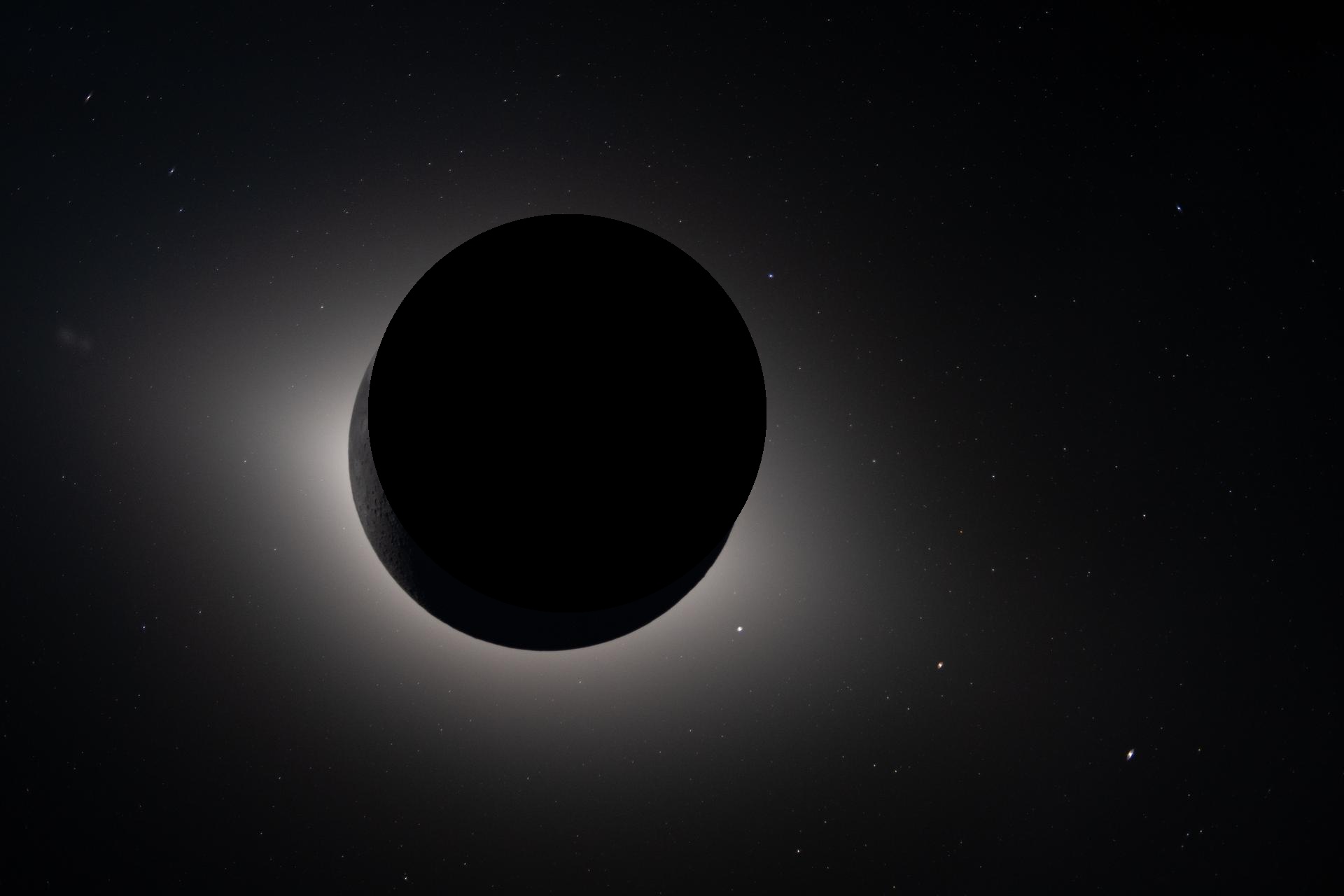 Claude's second masking attempt - almost the entire frame is black, with only a sliver of sky visible. The stars have been masked out along with the corona.